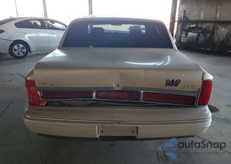 1996 Lincoln Town Car Cartier z USA, uszkodzony, nr VIN 1LNLM83W4TY734481